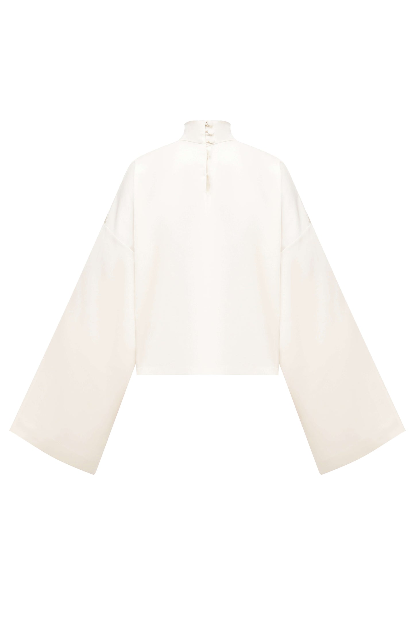 The Pearl Blouse. The Pearl Set. The Pearl Blouse. Cream silky blouse from the Pearl Set with wide sleeves.