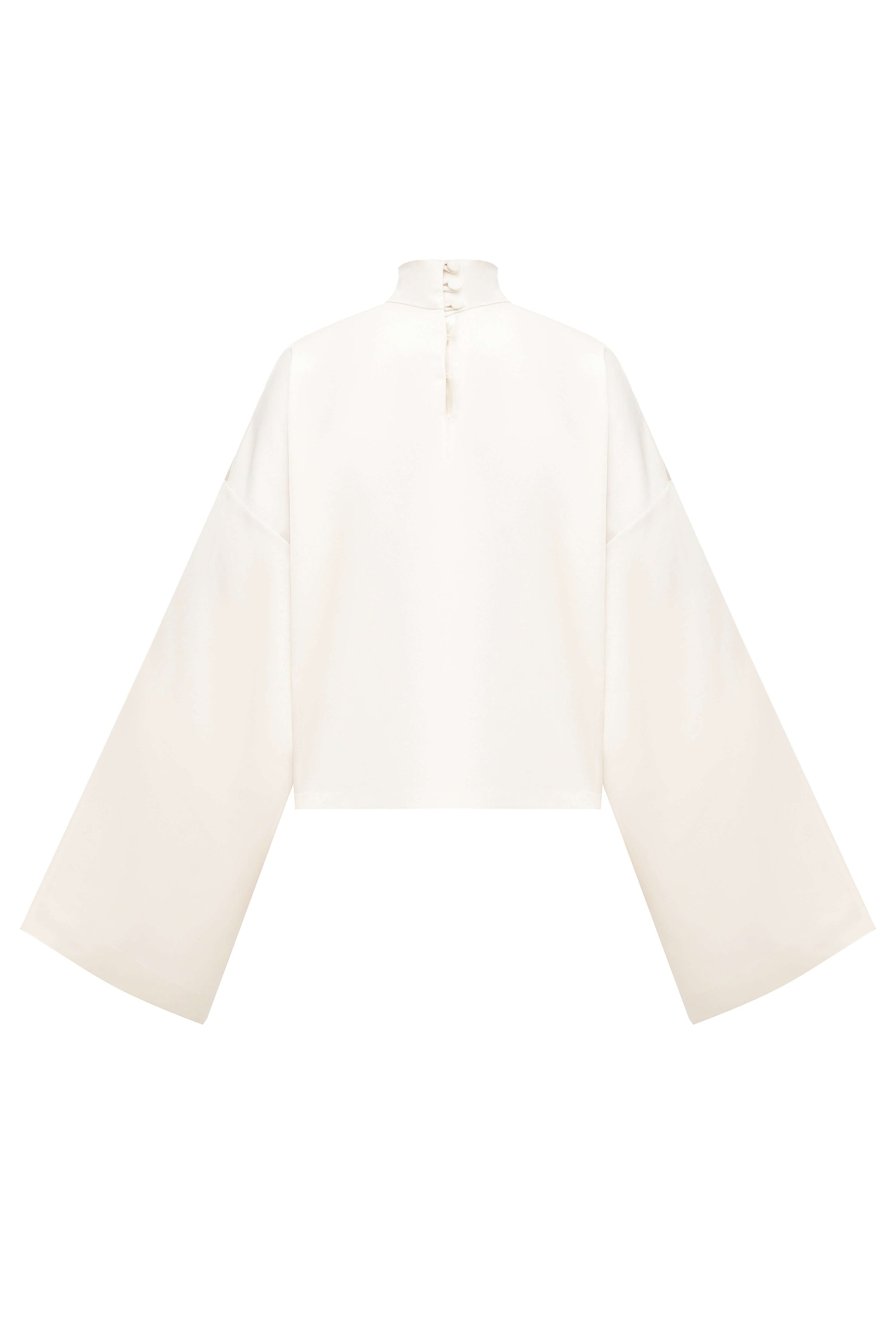 The Pearl Blouse. The Pearl Set. The Pearl Blouse. Cream silky blouse from the Pearl Set with wide sleeves. 