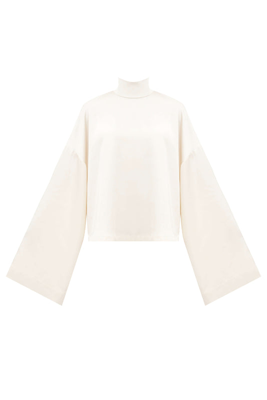 The Pearl Blouse. The Pearl Set. The Pearl Blouse. Cream satin blouse from the Pearl Set — soft matte finish, elegant minimalist silhouette by SBN.